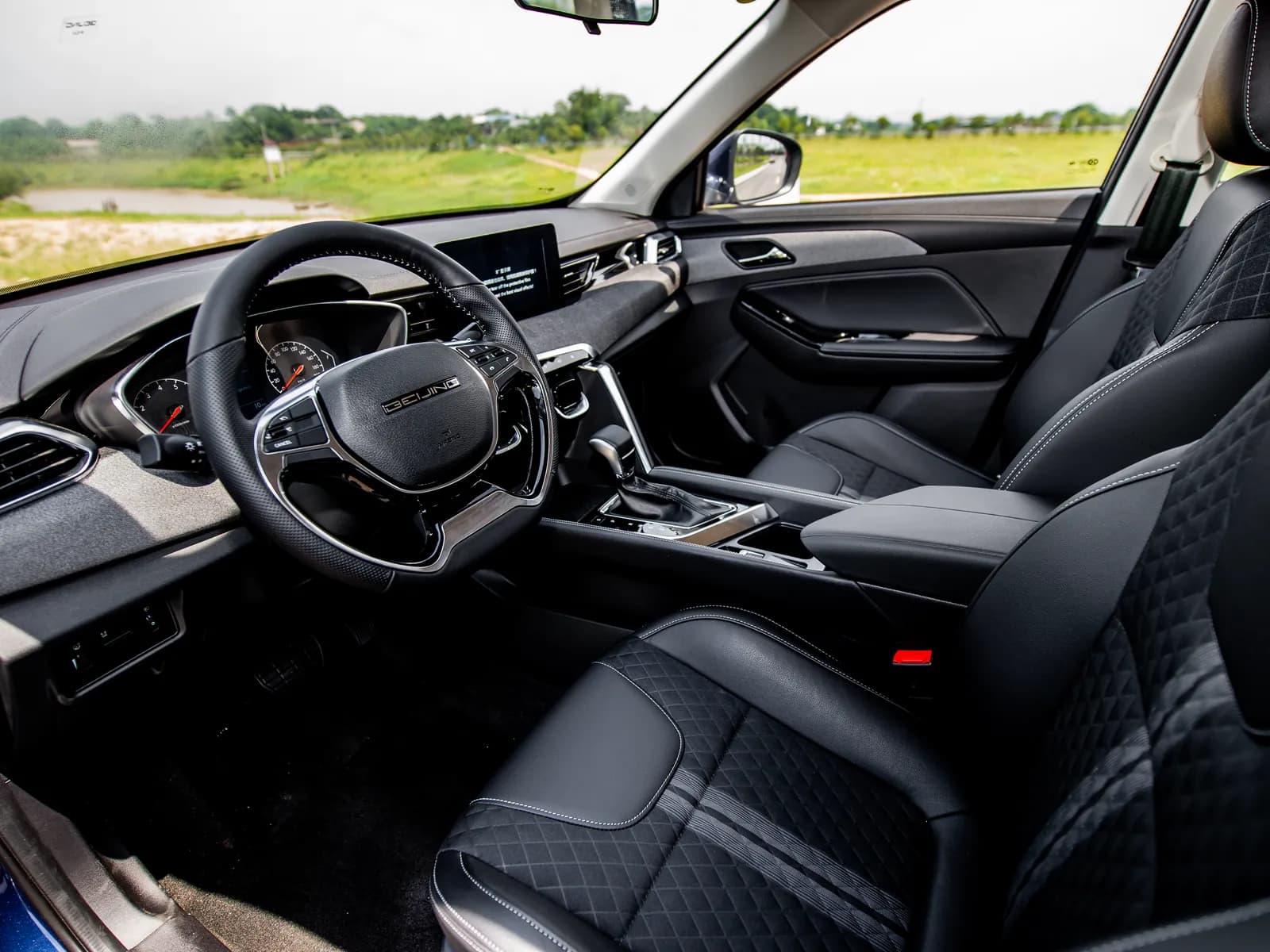 BAIC X35 dashboard, steering wheel and centre screen